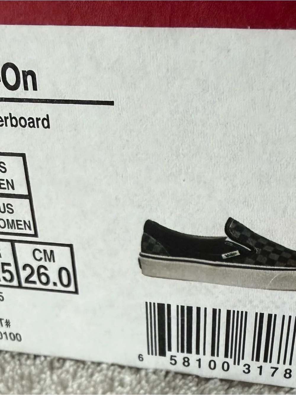 Vans Checkerboard Slip-On in Black and Grey
